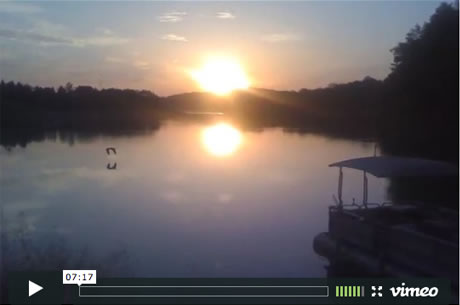 thumbnail image of the video describing the Pioneer Trading Post showing the lake